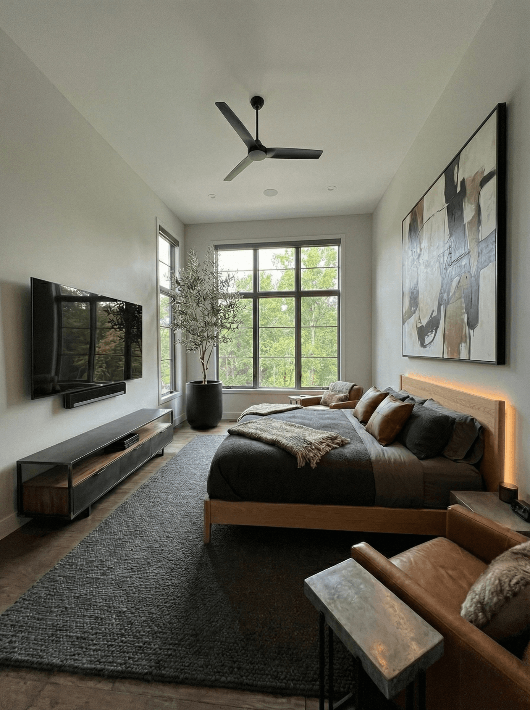 Modern bedroom featuring a backlit wooden headboard, large abstract painting, and floor-to-ceiling window view.